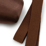 Capezio Pointe Shoe Elastic in Skintone 60, lifestyle view showing ribbed band beside pointe shoe