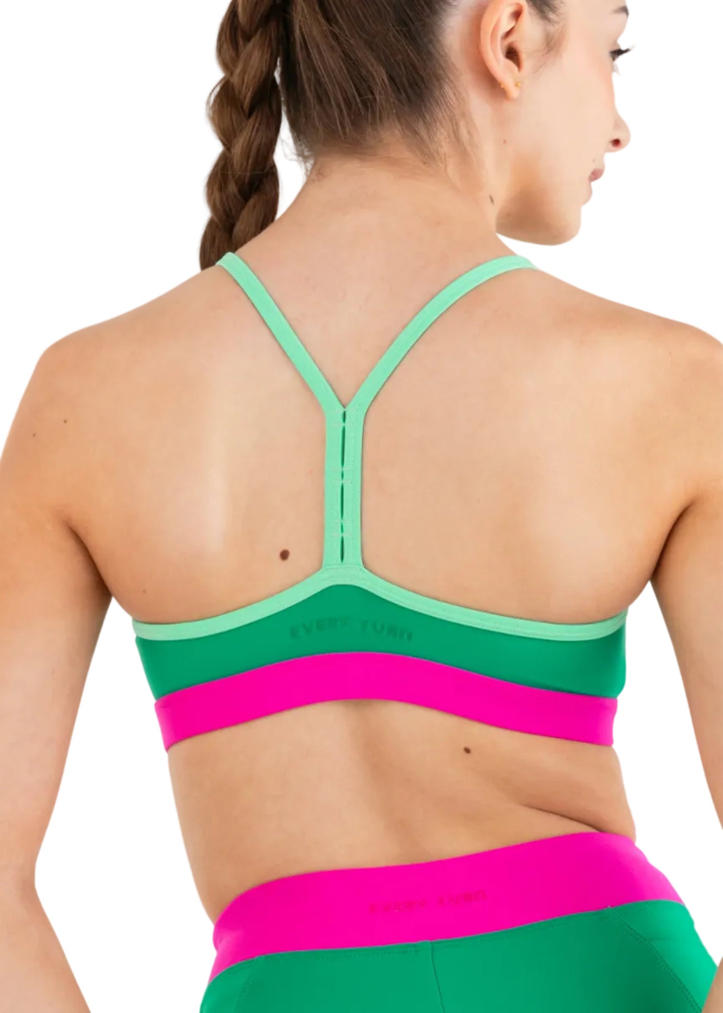 Every Turn Pop Culture Crop Top in Tiki Green, back detail view showing Y-shaped straps and color blocking