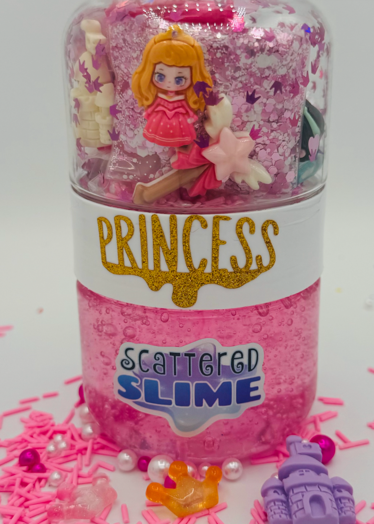 Scattered Slime Princess Slime Kit, front view showing pink slime, princess charm and sparkling mix-ins