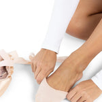 Capezio Pro Pad in Nude, lifestyle view showing thin gel toe pad with polyester covering fitted over toes