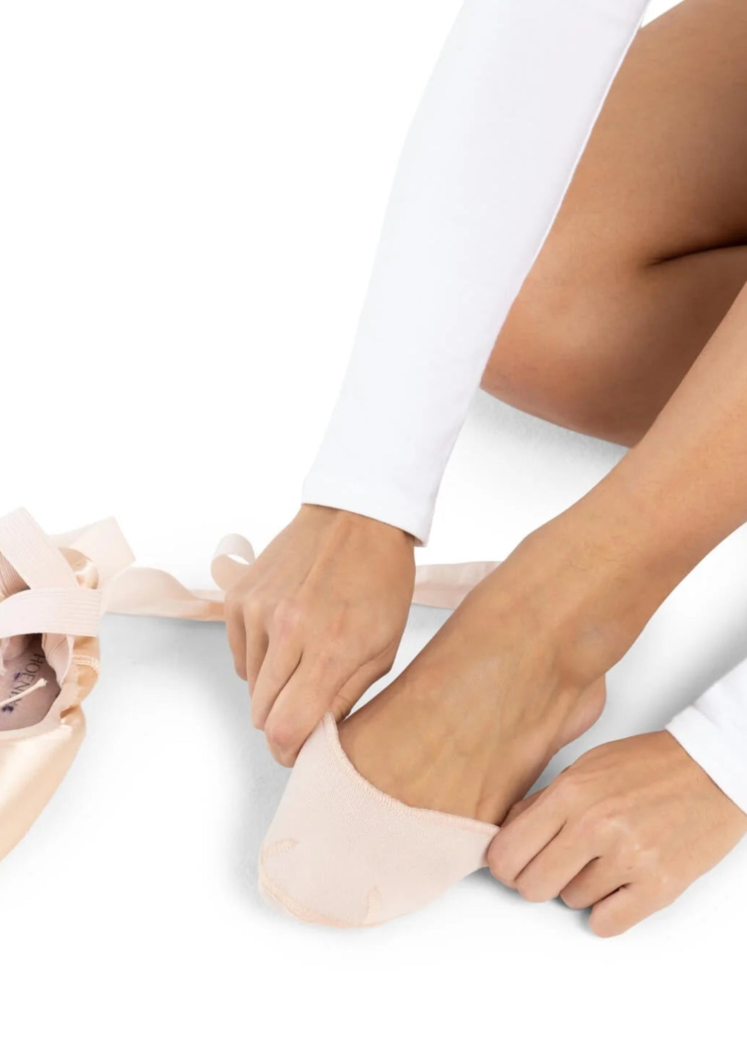 Capezio Pro Pad in Nude, lifestyle view showing thin gel toe pad with polyester covering fitted over toes