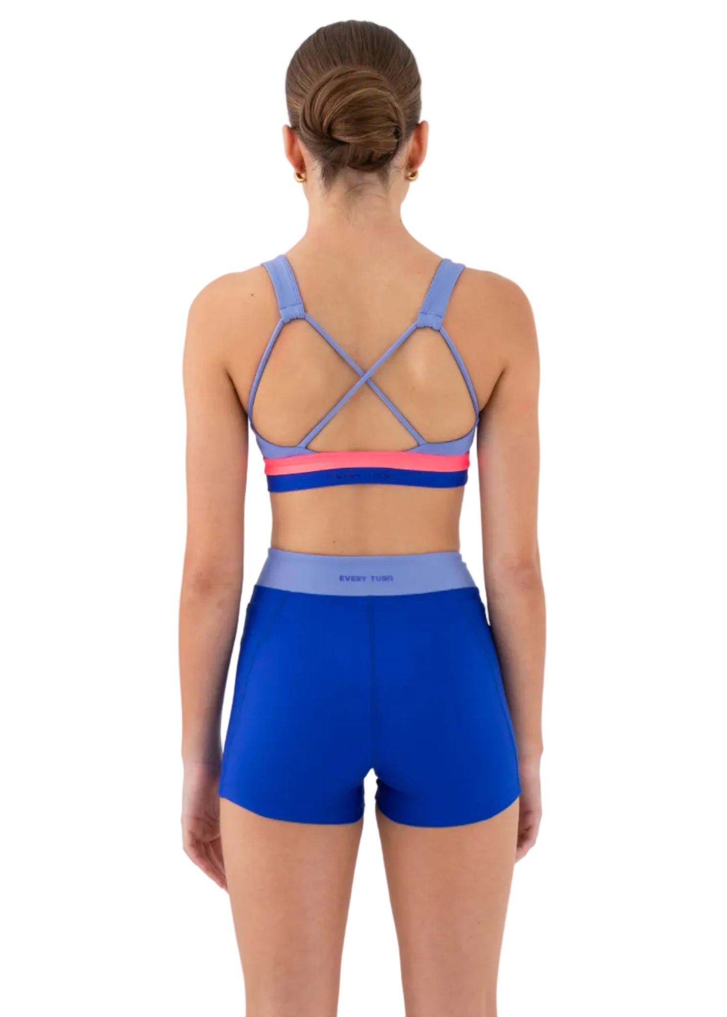 Every Turn Revolve Crop Top in Cobalt, back view showing open back with criss-cross straps