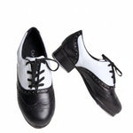 Capezio Leather tap shoe in black and white, top and medial side view showing wingtip styling and Tele Tone taps