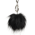 Danznmotion Sequin Duffel in Silver Sequin, detail view showing included black pom-pom zipper pull