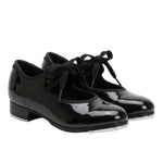 Capezio Children's Shuffle Tap Shoe in Patent Black, angled front view showing bow tie and Tele Tone taps