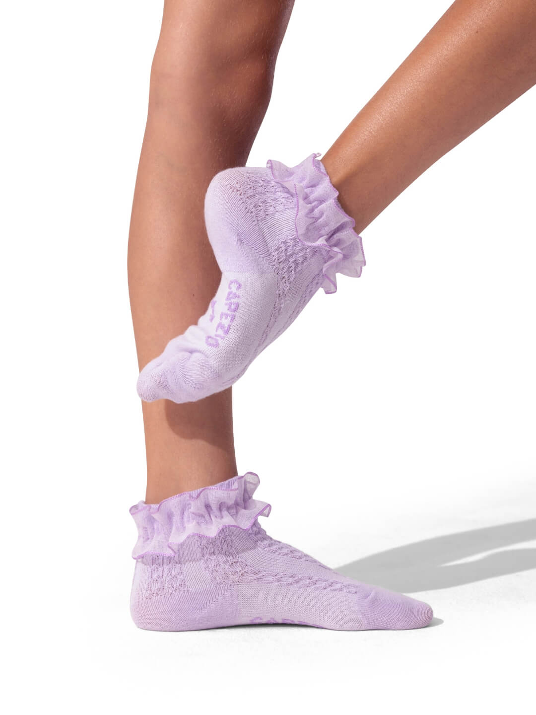 Capezio 3-Pack Ruffle Sock in Lavender, lifestyle view showing ruffled ankle trim and pointelle knit detail