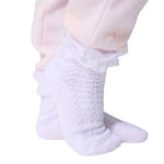 Capezio 3-Pack Ruffle Sock in White, lifestyle view showing ruffled ankle trim and pointelle knit detail