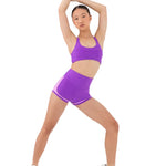Every Turn Socialite Crop Top in Power Purple, lifestyle view showing scoop neck and polyester-elastane fabric