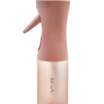 Kitsch Spray Bottle in Terracotta, side view showing terracotta plastic bottle with pump nozzle