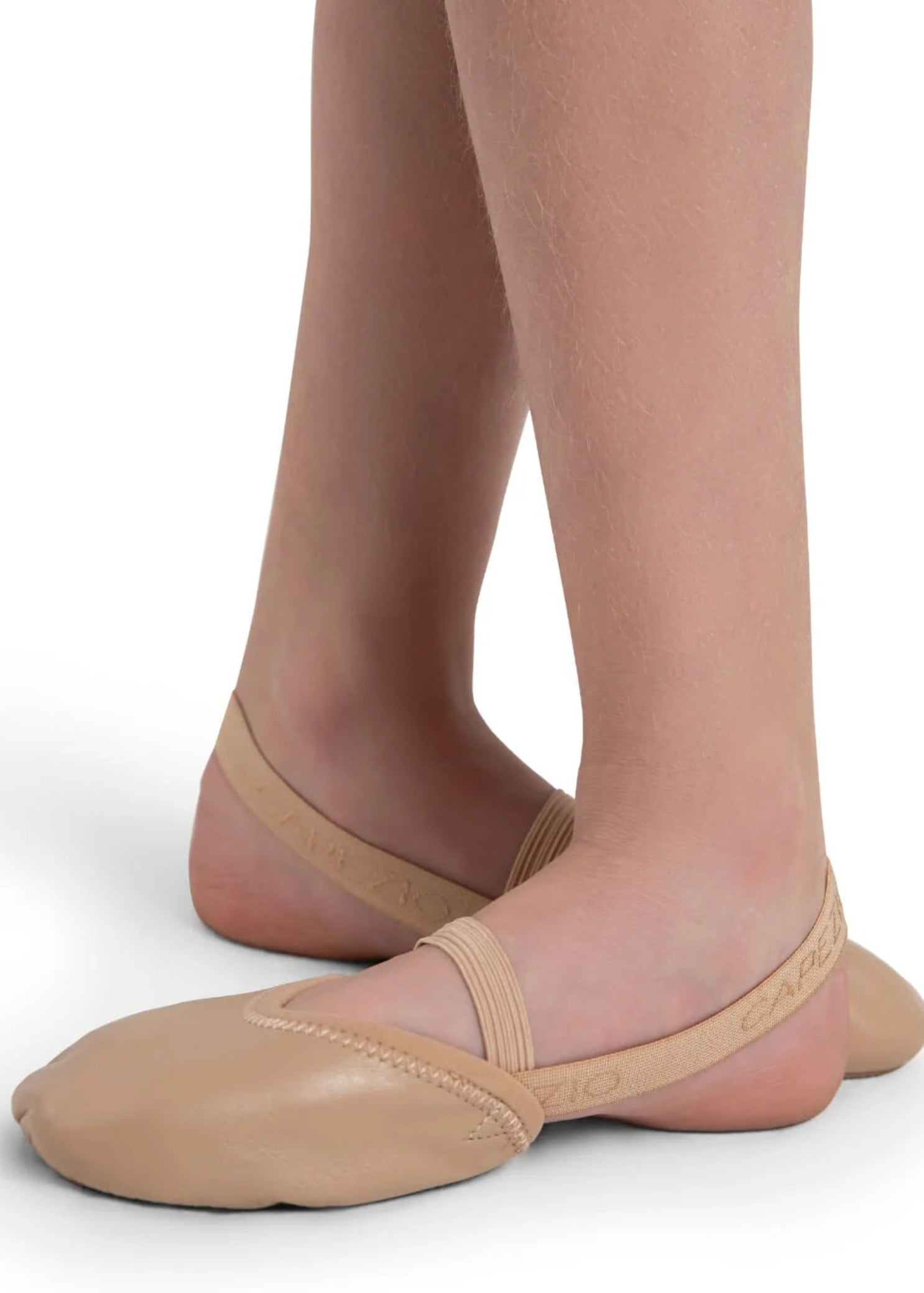 Capezio Turning Pointe 55 Half Sole in Nude, medial side view showing medial profile with wide suede forefoot patch