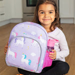 Wildkin Unicorn Backpack in Purple, lifestyle view showing unicorn print and water bottle in side mesh pocket