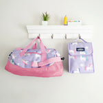 Wildkin Polyester Unicorn Overnighter Duffel in Purple, lifestyle view showing unicorn print and carry handles