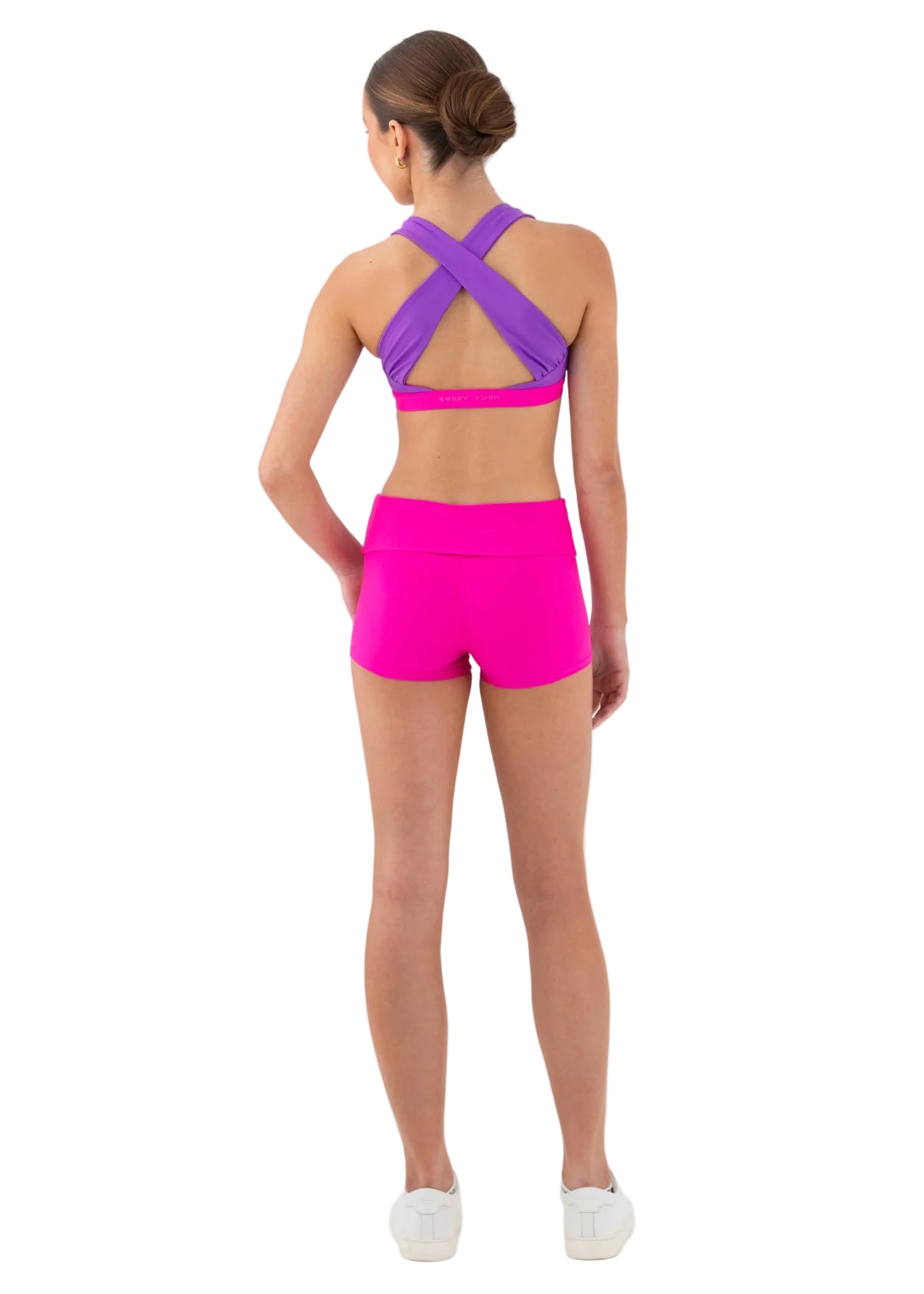 Every Turn Venus Foldover Short in Pink Cosmos, back view showing polyester-elastane fabric and fitted coverage