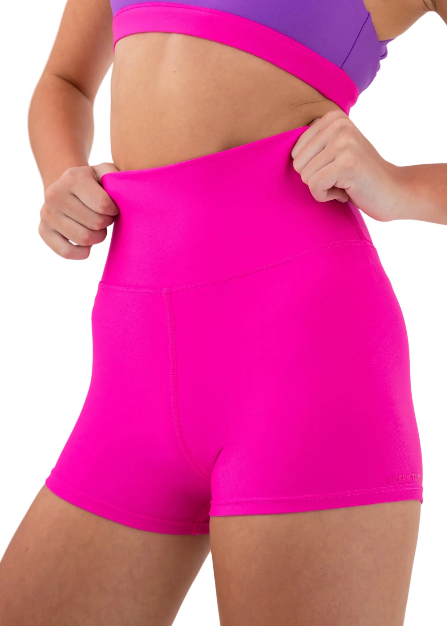 Every Turn Venus Foldover Short in Pink Cosmos, detail view showing tall foldover waistband and flatlock seams