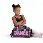 Danznmotion Wild About Dance Duffel in Pink, lifestyle view showing leopard print duffel with pink trim and dual handles