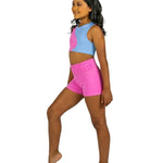 XO Dance Company Nylon/Spandex Ying Yang Top in Bubblegum, side view showing color blocking and cropped fit