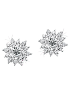 Pair of snowflake-shaped silver earrings with clear gemstones on a purple background