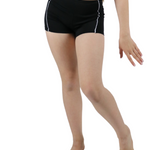 Young girl wearing a black and white sports outfit on a white background