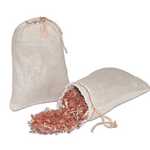 Pillows for Pointes cedar chip sachets, front view showing two linen drawstring bags with cedar chips spilling from one