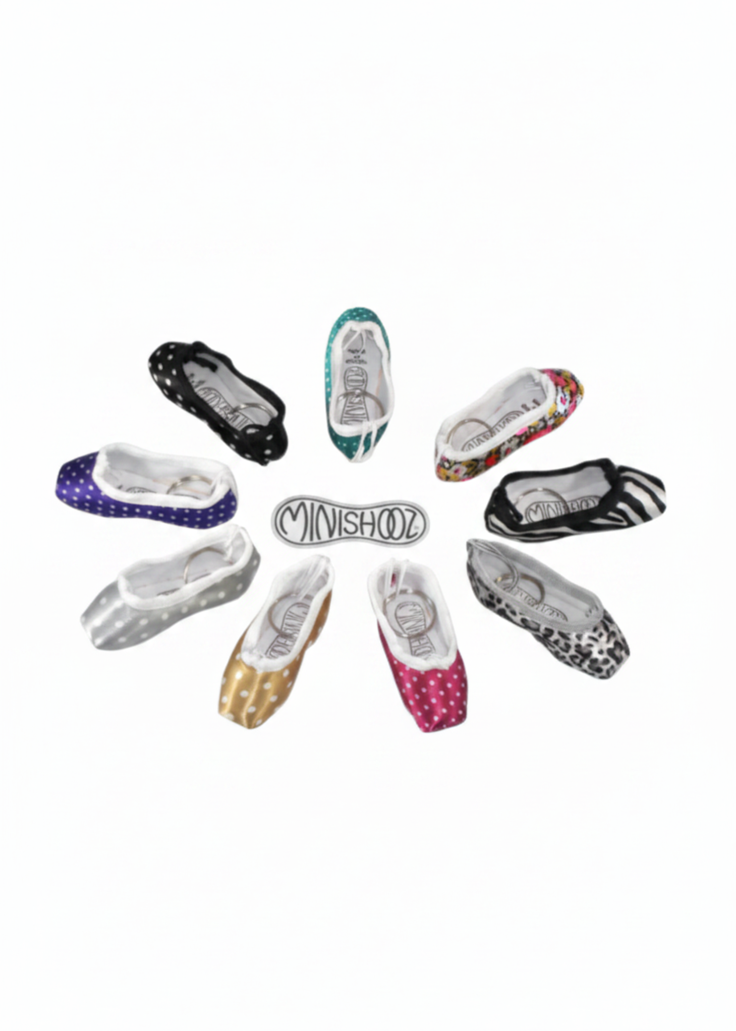 Mini patterned pointe shoe keychain with detailed design and durable key ring