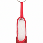 Red mini pointe shoe keychain with glitter accents and lightweight design