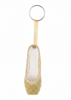 So Danca glitter mini pointe shoe keychain in Gold, side view showing gold glitter body, matching gold ribbon strap, white interior lining, and silver split key ring